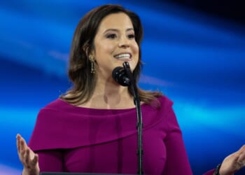New York GOP gubernatorial candidate Elise Stefanik, seen speaking at an event in February, is closing the gap on her opponent, Democratic Gov. Kathy Hochul.