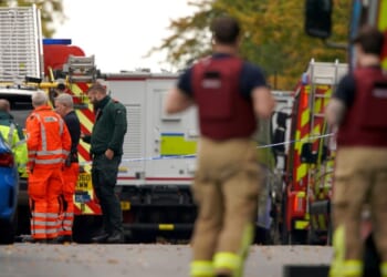Emergency service workers respond to a stabbing incident at Heaton Park Hebrew Congregation synagogue in Manchester, England, on Thursday.