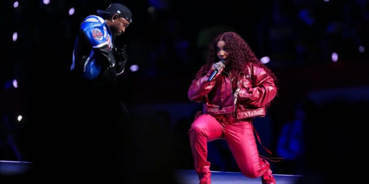 Kendrick Lamar performs with SZA Feb. 9 at halftime during the NFL Super Bowl 59 football game between the Kansas City Chiefs and the Philadelphia Eagles in New Orleans, Louisiana. With their Billboard Hot 100 No. 1 ‘Luther’ falling off the Hot 100 Oct. 25, "there were officially no rap songs in the chart’s top 40 last week,” Billboard announced.