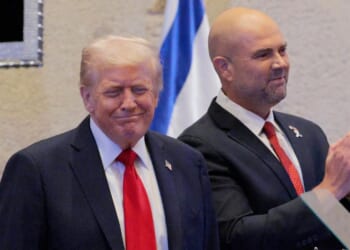 President Donald Trump arrives to address the Knesset, Israel’s parliament, with Amir Ohana, Speaker of the Israeli Knesset, on Oct. 13, 2025, in Jerusalem.