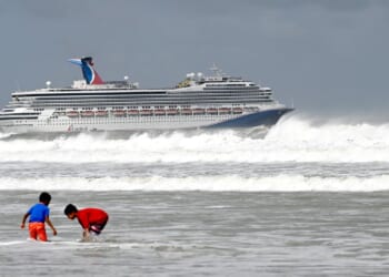 Cruise circling Australia canceled after death of 80-year-old woman left behind on island