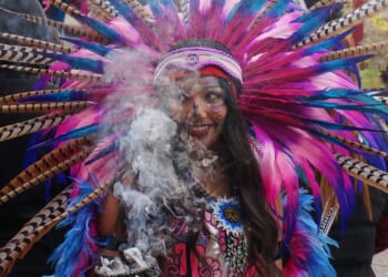 Joyful Day of the Dead commemorations rally U.S. Latino communities despite immigration raid fears