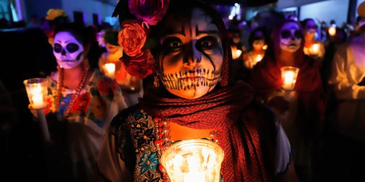 From Mexico to Germany, photos capture the Day of the Dead celebrations