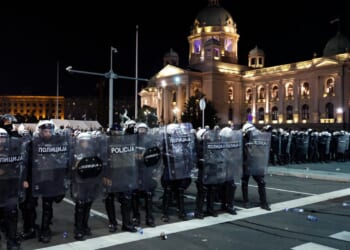 Riot police separate opponents, loyalists of Serbia's president as tensions soar amid protests