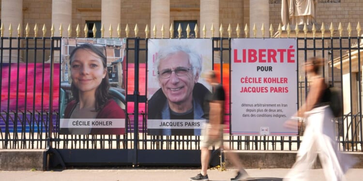 Iran releases 2 French nationals after 3-year detention