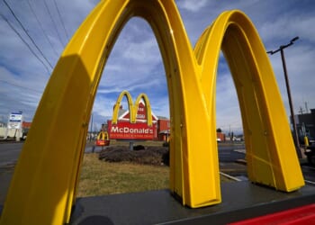 McDonald's boosts 3rd-quarter sales by emphasizing value but warns customers remain pressured