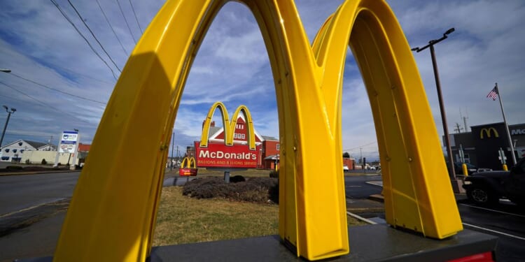 McDonald's boosts 3rd-quarter sales by emphasizing value but warns customers remain pressured