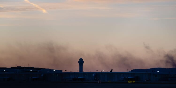 Officials scouring charred site of Kentucky UPS plane crash for victims and answers