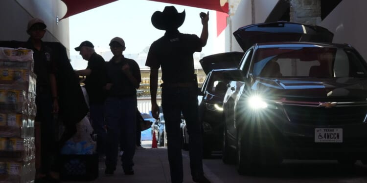 Government says SNAP benefit cuts won't be as deep as announced for some families