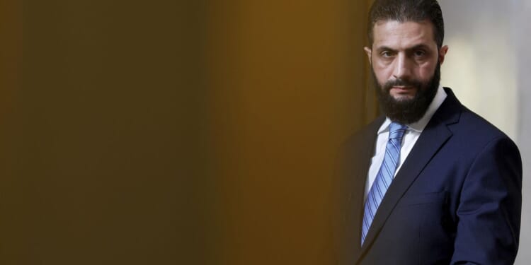 U.S. removes sanctions on Syrian president ahead of Trump visit