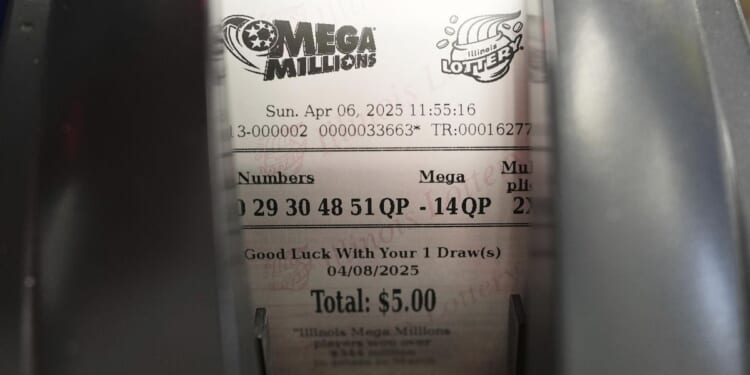 Mega Millions jackpot up to $900 million for next drawing, would be game's eighth-largest prize ever
