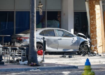 Motorist fleeing police slams into Florida bar, killing 4 and injuring 11