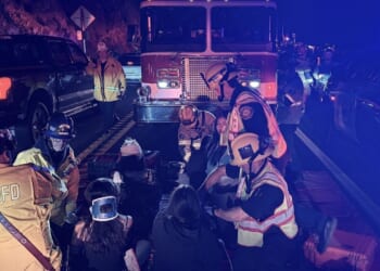 19 hospitalized after bus overturns on a California highway