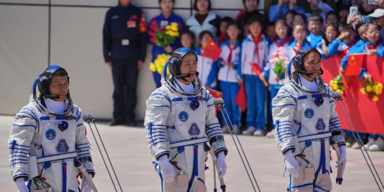 China's stranded astronauts 'in good condition' after space debris delays return