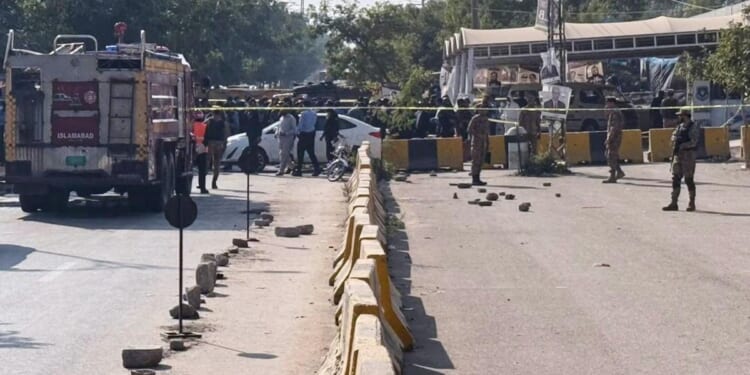 Pakistan's interior minister: A suicide bomber targets an Islamabad court, killing 12