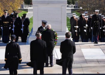 Trump marks Veterans Day, extolling the 'muscle, spine and steel' of U.S. military members