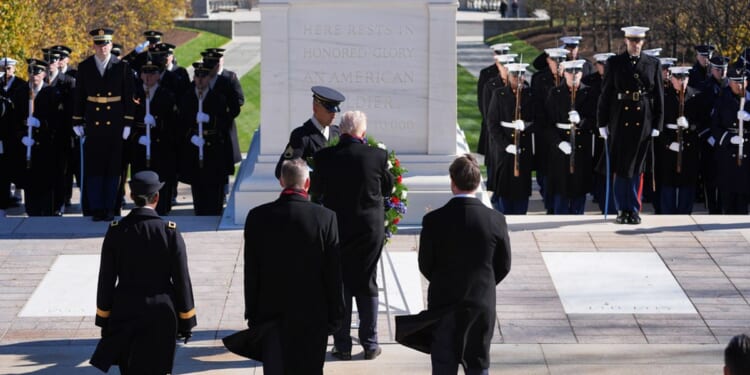 Trump marks Veterans Day, extolling the 'muscle, spine and steel' of U.S. military members