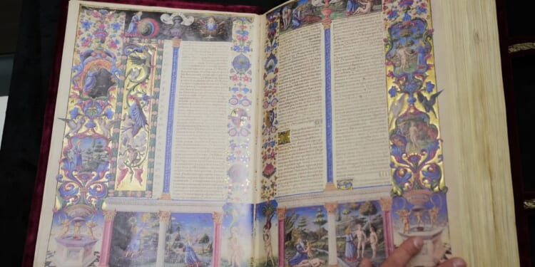 Bible from 15th century described as 'Mona Lisa of illuminated manuscripts' goes on display in Rome