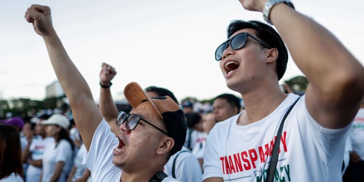 Rallygoers in the hundreds of thousands in Manila against flood-control corruption scandal