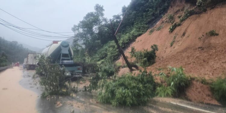 Heavy rain triggers landslides and floods in central Vietnam, killing seven