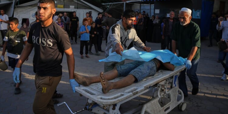 Israel launches strikes in Gaza ceasefire's latest test as hospitals say 20 killed