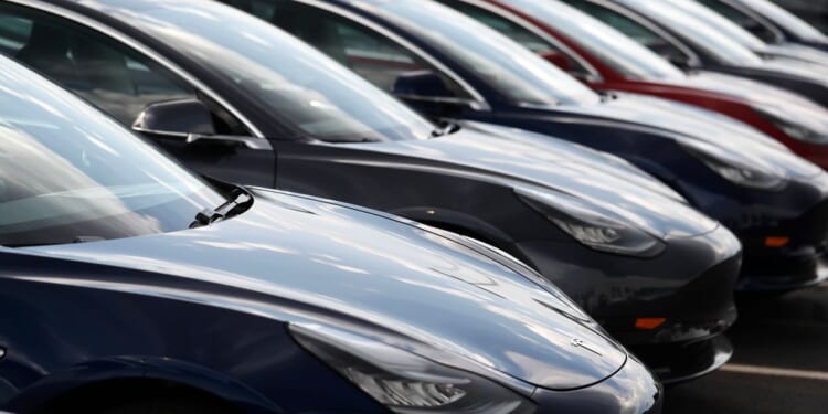 Lawsuit blames Tesla design flaws for crash that killed Washington state woman injured her husband