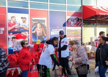 C.J. Abrams, James Wood dish out Thanksgiving meals to families in need at Nationals Park