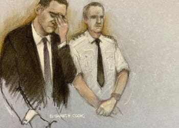 Man accused of driving into crowds at Liverpool soccer parade appears in court for trial