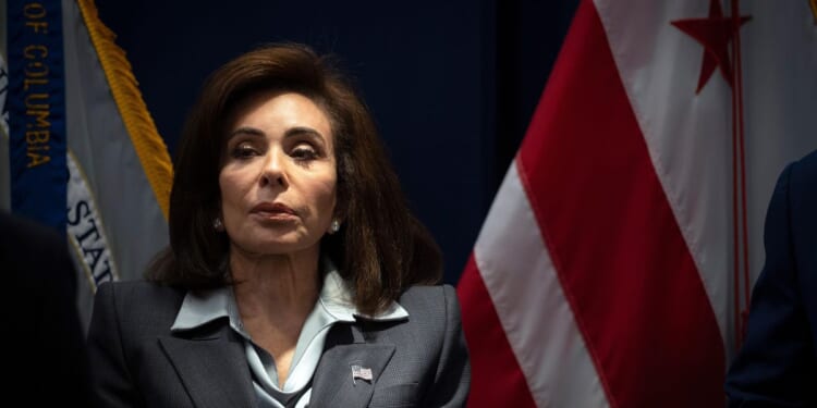 Suspect in shooting of National Guard troops now facing a first-degree murder charge