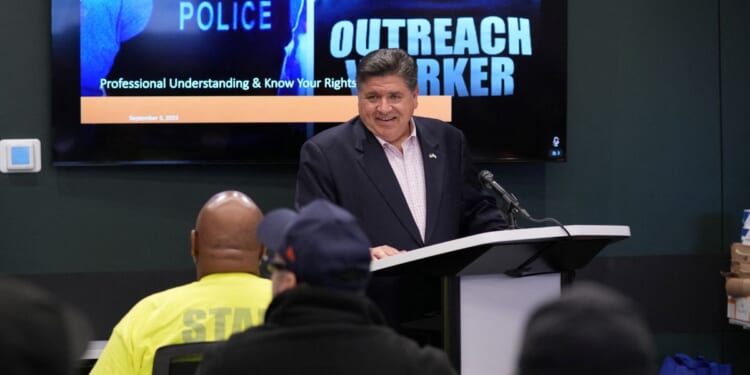 Illinois Gov. J.B. Pritzker meets with community violence intervention leaders as they hold an emergency response training to prepare for federal deployments in Chicago, Illinois, on Sept. 3, 2025.
