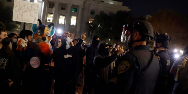 Protesters clash with police at the University of California, Berkeley on Nov. 10, 2025 in Berkeley, California.