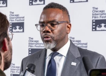 Chicago Mayor Brandon Johnson speaks to a reporter on the red carpet during the 61st Chicago Film Festival at AMC Newcity 14 on Oct. 24, 2025, in Chicago, Illinois.