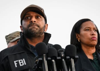 FBI Director Kash Patel speaks as D.C. Mayor Muriel Bowser looks on during a news conference after a shooting in downtown Washington, D.C., on Nov. 26, 2025.