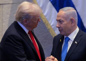President Donald Trump Israeli and Prime Minister Benjamin Netanyahu interact after Netanyahu addressed the Knesset on Oct. 13, 2025, in Jerusalem.