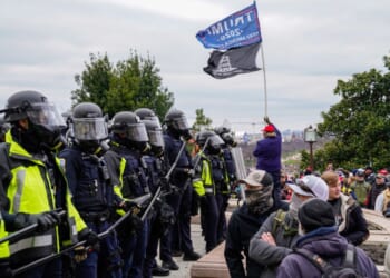 Capitol Hill police hold back protesters as crowds gather outside the U.S. Capitol for the "Stop the Steal" rally on Jan. 6, 2021, in Washington, D.C.