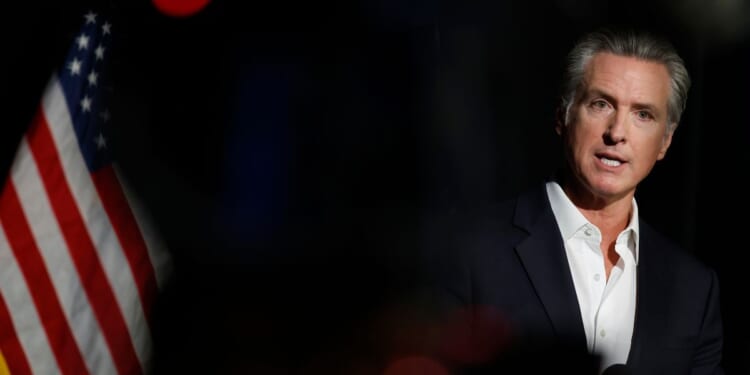 California Governor Gavin Newsom speaks to journalists in Stockton, California, on Oct. 22, 2025.