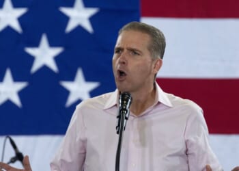 Conservative commentator Scott Jennings speaks at the Ashley's BBQ Bash fundraiser hosted by U.S. Rep. Ashley Hinson on August 23, 2025, in Cedar Rapids, Iowa.