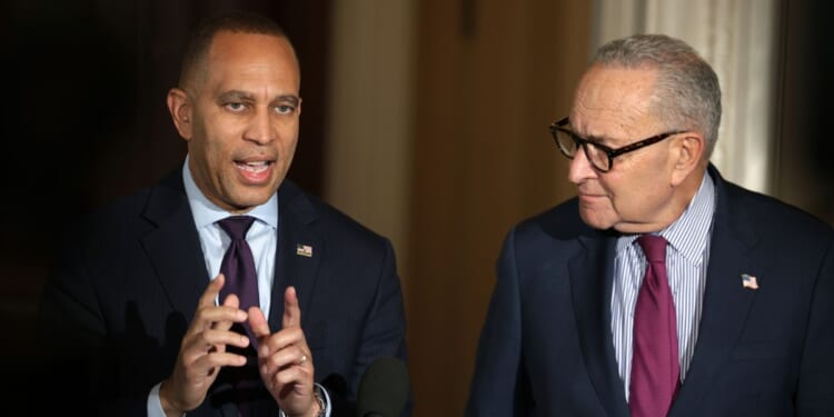Senate Minority Leader Chuck Schumer and House Minority Leader Hakeem Jeffries speak to news reporters in Washington, DC on Oct. 16, 2025.