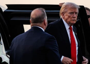 President Donald Trump steps out of the presidential limousine before boarding Air Force One en route to the White House on Nov. 2, 2025, at Palm Beach International Airport in West Palm Beach, Florida.
