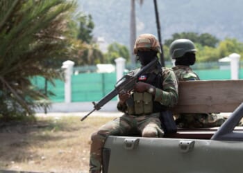 Members of the Haitian armed forces patrol the city center near the National Palace in Port-au-Prince on Oct. 1, 2025.