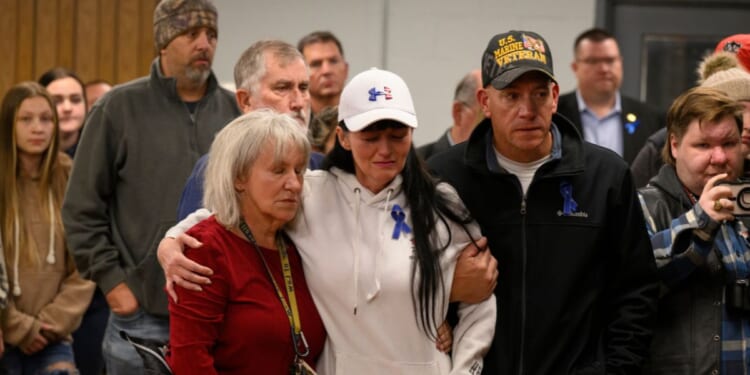 Community members gather at a vigil for West Virginia National Guard Specialist Sarah Beckstrom at the town hall on Nov. 28, 2025, in Webster Springs, West Virginia.