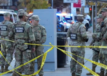 Members of the National Guard troops gather near the White House after reports of two National Guard soldiers being shot nearby in Washington, DC on Nov. 26, 2025.