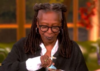Whoopi Goldberg tears up a note that had been passed to her during Monday's episode of "The View," containing a clarification or correction of a statement she'd made about President Donald Trump.