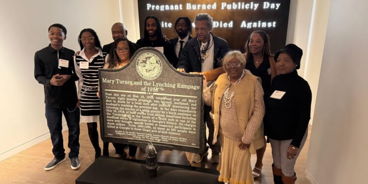 Bullet-pocked marker memorializing 1918 lynching goes on display in Atlanta