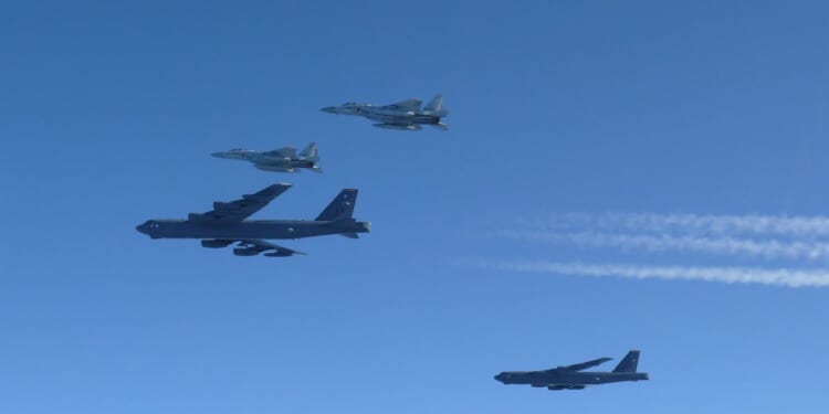 U.S. wades into China-Japan confrontation with tough talk, B-52 flights