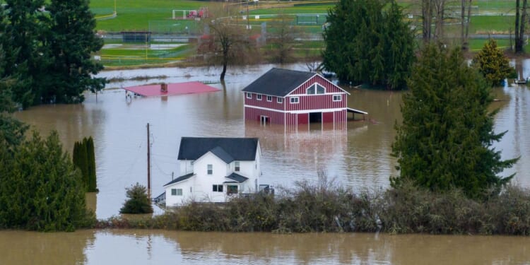 Washington state faces historic floods that have stranded families and washed away homes