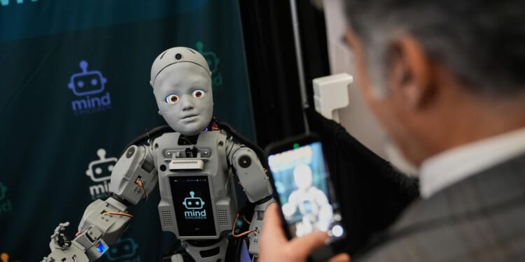 Humanoid robots take the stage at Silicon Valley summit, but skepticism remains