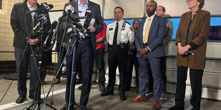 Police have person of interest in custody over Brown University shooting that killed 2, wounded 9