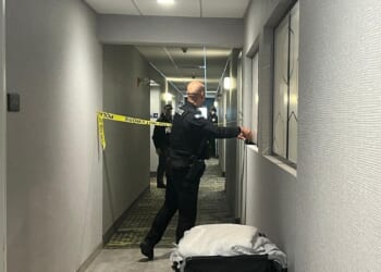 Person of interest in custody after shooting at Brown University kills two and wounds nine others