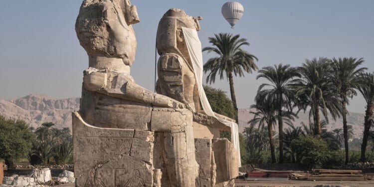 Egypt reveals restored colossal statues of pharaoh in Luxor